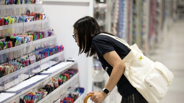 A customer browses pens at an Officeworks store, operated by Wesfarmers Ltd., in Sydney, Australia, on Tuesday, Feb. 14, 2023. Wesfarmers is scheduled to release earnings results on Feb. 15. Photographer: Brent Lewin/Bloomberg