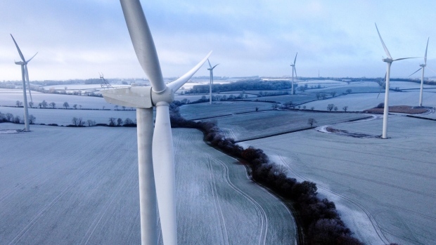 Wind turbines near Kettering, UK, on Wednesday, Dec. 14, 2022. UK power prices for Monday jumped to record levels as freezing temperatures are set to cause a surge in demand, just as a drop in wind generation causes a supply crunch. Photographer: Chris Ratcliffe/Bloomberg