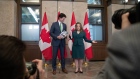 Justin Trudeau and Chrystia Freeland hold copies of the federal budget in Ottawa on Tuesday. Photographer: David Kawai/Bloomberg