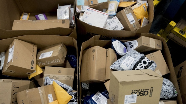 Packages at USPS processing center in Virginia. Photographer: Andrew Harrer/Bloomberg 