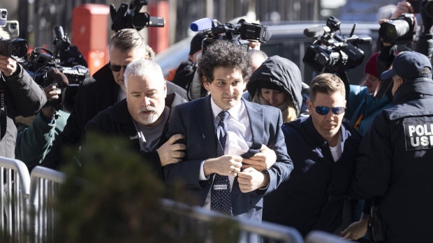 Sam Bankman-Fried, co-founder of FTX Cryptocurrency Derivatives Exchange, arrives at court in New York, US, on Thursday, March 30, 2023. Bankman-Fried faces a total of 13 counts ranging from conspiracy to commit wire fraud to conspiracy to violate the anti-bribery provisions of the Foreign Corrupt Practices Act, and faces more than 155 years in prison if convicted of all of them - although any sentence is likely to be much lower if he is found guilty.
