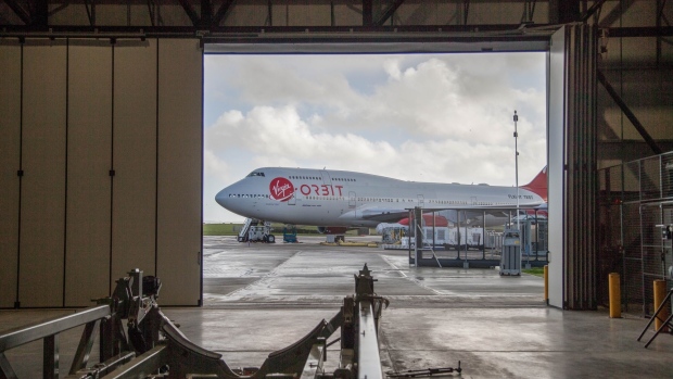 The 'Cosmic Girl' Boeing Co. 747 launch aircraft, operated by Virgin Orbit Holdings Inc., on the tarmac at Spaceport Cornwall, located at Cornwall Airport Newquay, in Newquay, UK, on Tuesday, Nov. 8, 2022. Britain's first-ever space launch is on track to take place before the end of November, according to billionaire entrepreneur Richard Branson, whose Virgin Orbit will undertake the mission.