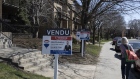 A "Sold" sign in Lasalle, Quebec, Canada, on Saturday, April 15, 2023. Canadian home prices rose for the first time in a year after the country’s central bank halted its interest rate hikes and sellers remained hesitant to list their properties.