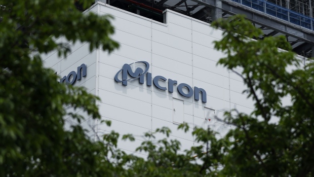 Signage atop a plant operated by Micron Memory Japan KK, a subsidiary of Micron Technology Inc., in Higashihiroshima, Hiroshima Prefecture, Japan, on Monday, May 22, 2023. Japan will subsidize US memory maker Micron's push to produce its new advanced chips in Hiroshima.