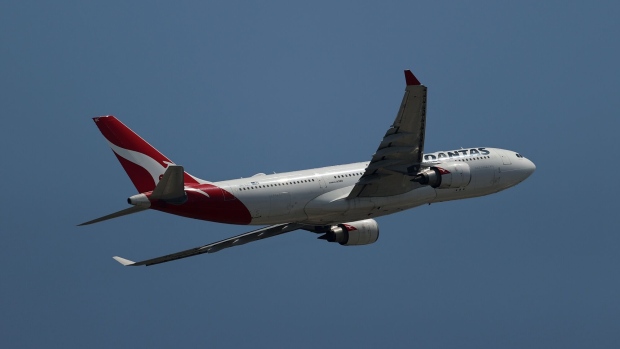 An Airbus SE A330 aircraft operated by Qantas Airways Ltd. takes off from Sydney Airport in Sydney, Australia, on Monday, Feb. 20, 2023. Qantas is scheduled to release earnings results on Feb. 23. Photographer: Brendon Thorne/Bloomberg
