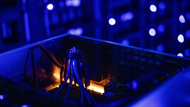 Cables inside a draw housing graphics processing units (GPU) used to mine the Ethereum and Zilliqa cryptocurrencies at the Evobits crypto farm in Cluj-Napoca, Romania, on Wednesday, Jan. 22, 2021. The world’s second-most-valuable cryptocurrency, Ethereum, rallied 75% this year, outpacing its larger rival Bitcoin. Photographer: Akos Stiller/Bloomberg