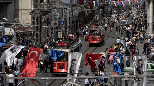 Shoppers and trams on Istiklal Street in Istanbul, Turkey, on Thursday, June 8, 2023.  Photographer: Moe Zoyari/Bloomberg