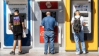 Customers use automated teller machines (ATM) in Ankara, Turkey, on Monday, on June 26, 2023. 