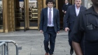 Sam Bankman-Fried, co-founder of FTX Cryptocurrency Derivatives Exchange, leaves court in New York, US, on Wednesday, July 26, 2023. Bankman-Fried faces a total of 13 counts ranging from conspiracy to commit wire fraud to conspiracy to violate the anti-bribery provisions of the Foreign Corrupt Practices Act, and faces more than 155 years in prison if convicted of all of them - although any sentence is likely to be much lower if he is found guilty. Photographer: Victor J. Blue/Bloomberg