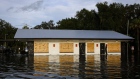 A retail store partially submerged in floodwaters after Hurricane Idalia made landfall in Cristal River, Florida, US, on Wednesday, Aug. 30, 2023. Hurricane Idalia knocked out power to hundreds of thousands of Florida customers, grounding more than 1,800 flights and unleashing floods along far from where it came ashore as a Category 3 storm earlier Wednesday.