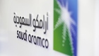 A Saudi Aramco logo sits on display during the Abu Dhabi International Petroleum Exhibition & Conference (ADIPEC) in Abu Dhabi, United Arab Emirates, on Tuesday, Nov. 13, 2018. OPEC’s secretary-general, energy ministers from Saudi Arabia to Russia, CEOs at oil majors from Total SA, BP Plc and Eni SpA, and officials from Middle Eastern energy giants such as Abu Dhabi’s Adnoc have gathered to sign deals and discuss oil, gas, refining and petrochemical issues. Photographer: Christopher Pike/Bloomberg