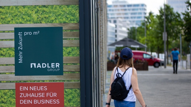 Branding for Adler Group SA at the Quartier Heidestrasse residential and commercial project, by Aggregate Holdings SA, under construction in central Berlin, Germany, on Monday, July 4, 2022. Aggregate has sold parts of the Heidestrasse project in order to repay bonds and loans and shore up its finances after allegations of systemic fraud were leveled at Adler Group SA, a German real estate firm in which it was the largest shareholder.
