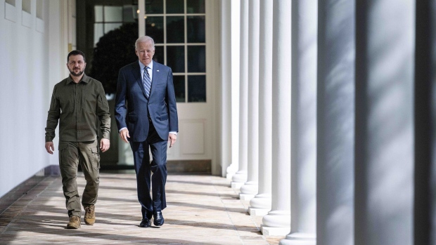 US President Joe Biden and Volodymyr Zelenskiy, Ukraine's president, left, walk through the Colonnade of the White House in Washington, DC, US, on Thursday, Sept. 21, 2023. Zelenskiy pressed US lawmakers privately for sustained support to counter Russia's war machine in a conflict that allies now fear will drag on for years, just as hardline Republicans are threatening to halt additional aid. Photographer: Jim Watson/AFP/Bloomberg