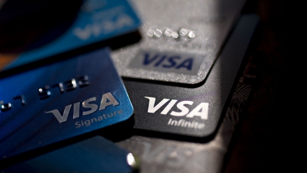 Visa Inc. credit and debit cards are arranged for a photograph in Washington, D.C., U.S., on Monday, April 22, 2019. Visa Inc. is scheduled to release earnings figures on April 24. Photographer: Andrew Harrer/Bloomberg