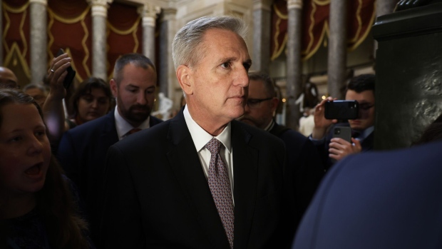 WASHINGTON, DC - OCTOBER 02: Speaker of the House Kevin McCarthy (R-CA) is pursued by journalists in Statuary Hall at the U.S. Capitol on October 02, 2023 in Washington, DC. Rep. Matt Gaetz (R-FL) said he would file a motion to vacate and attempt to oust McCarthy from the speakership following an agreement over the weekend to avert a partial shutdown of the federal government. (Photo by Chip Somodevilla/Getty Images)