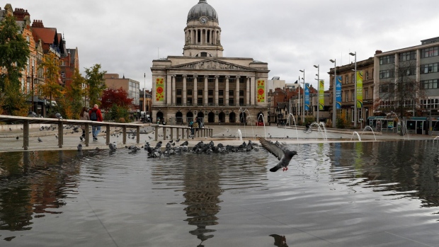 A water feature in the Old Market Square as the city heads into the highest level of coronavirus restrictions, in Nottingham, U.K., on Friday, Oct. 30, 2020. U.K. Prime Minister Boris Johnson is under growing pressure to introduce another national lockdown as scientists warn measures to control the pandemic in England are failing, with opposition leader Keir Starmer joining calls for tougher action.