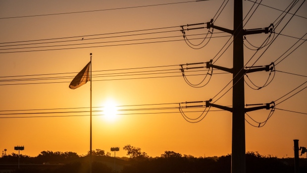 Power lines in Austin, Texas, US, on Friday, Sept. 8, 2023. Texas is in the midst of its worst power crisis since a deadly winter storm more than two years ago, with utilities urging customers to unplug electric vehicles and pool filters to conserve power.