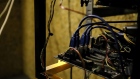 A mining rig in a cryptocurrency mining farm in Arnhem, Netherlands, on Thursday, Nov. 10, 2022. FTX cryptocurrency exchange rattled the financial world this week when a crisis of investor confidence triggered a run, forcing the company to scramble for a buyer or bailout to avoid collapse. Photographer: Valeria Mongelli/Bloomberg