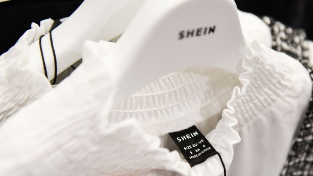 The Shein logo on a hanger at the Shein Tokyo showroom in Tokyo, Japan, on Wednesday, Nov. 16, 2022. Fast fashion retailer Shein opened its first permanent store in the world in the Harajuku district of Tokyo on Nov. 13.