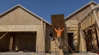 A contractor works on a house under construction at the Toll Brothers Regency at Folsom Ranch community in Folsom, California, US, on Thursday, May 18, 2023. 