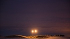 Gas flares are seen in the Bakken Formation outside Watford City, North Dakota, U.S., on Friday, March 9, 2018. When oil sold for $100 a barrel, many oil towns dotting the nation's shale basins grew faster than its infrastructure and services could handle. Since 2015, as oil prices floundered, Williston has added new roads, including a truck route around the city, two new fire stations, expanded the landfill, opened a new waste water treatment plant and started work on an airport relocation and expansion project.