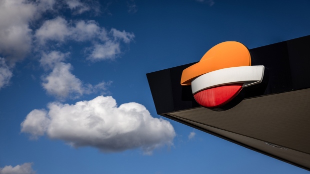 A logo on the roof of a Repsol SA gas station in the Zona Franca district of Barcelona, Spain, on Tuesday, Oct. 24, 2023. Repsol report earnings on Oct. 26. Photographer: Angel Garcia/Bloomberg