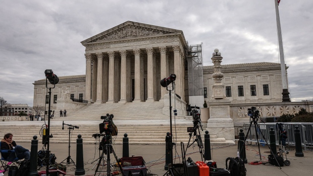<p>Members of the media outside the US Supreme Court in Washington, DC on March 4.</p>