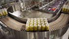 <p>A package of beer cans moves along a conveyor at the Waterloo Brewing brewery in Waterloo, Ontario, Canada.</p>