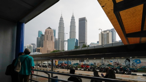 The Petronas Twin Towers, center, in Malaysia, on Friday, March 22, 2024. Malaysia is expected to release CPI figures on March 25. Photographer: Samsul Said/Bloomberg