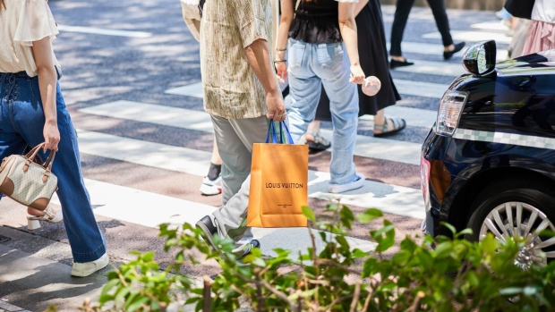 <p>Shoppers in the Omotesando area of Tokyo.</p>