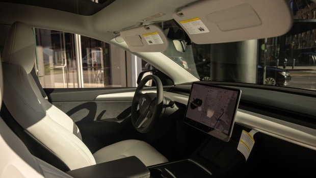 The interior of a Tesla Model Y electric vehicle at the company’s showroom in New York.
