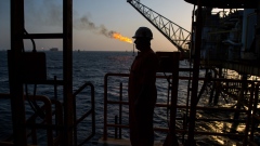 A gas flame burns from a pipe close to an offshore oil platform in the Persian Gulf's Salman Oil Field, operated by the National Iranian Offshore Oil Co., near Lavan island, Iran, on Thursday, Jan. 5. 2017. Nov. 5 is the day when sweeping U.S. sanctions on Iran’s energy and banking sectors go back into effect after Trump’s decision in May to walk away from the six-nation deal with Iran that suspended them. Photographer: Ali Mohammadi/Bloomberg