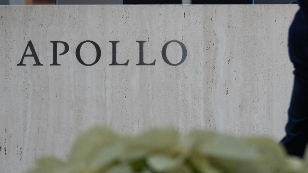 Apollo Global Management signage in New York. Photographer: Jeenah Moon/Bloomberg