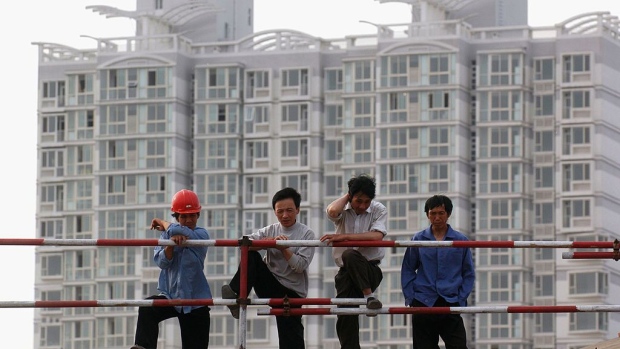 CHENGDU, CHINA - MAY 26: (CHINA OUT; PHOTOCOME OUT) Workers rest at a construction site of new buildings on May 26, 2005 in Chengdu of Sichuan Province, China. In the past two months the Chinese government has raised taxes on real estate transactions and enacted other measures designed to discourage speculative dealing in property that it said had pushed real estate prices to unsustainable levels, pricing most local residents out of the market. (Photo by China Photos/Getty Images) Photographer: China Photos/Getty Images AsiaPac
