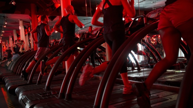Clients exercise in a class at a Barry’s Bootcamp studio in New York.