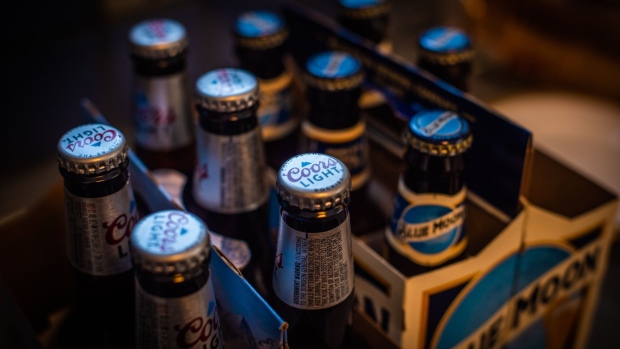 Bottles of Molson Coors Brewing Co. Blue Moon brand beer arranged in Dobbs Ferry, New York, U.S., on Saturday, Feb. 6, 2021. Molson Coors Brewing Co. is scheduled to release earnings figures on February 11. Photographer: Tiffany Hagler-Geard/Bloomberg