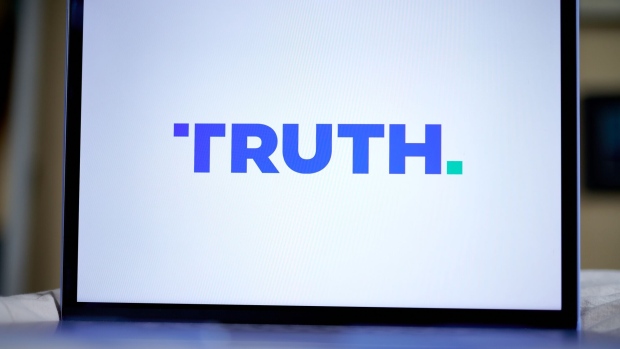 The Truth Social logo on a laptop arranged in New York, US, on Friday, March 22, 2024. Shareholders of Digital World Acquisition Corp., a publicly traded shell company, approved a deal to merge with the Trump's media business in a Friday vote. That means Trump Media & Technology Group, whose flagship product is social networking site Truth Social, will soon begin trading on the Nasdaq stock market, reported the AP. Photographer: Gabby Jones/Bloomberg