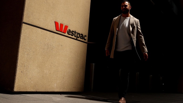 <p>A pedestrian walks past the Westpac Place building in Sydney, Australia.</p>