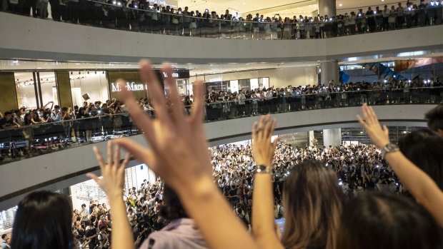 Demonstrators sing “Glory to Hong Kong” during a flash mob event in Hong Kong in 2019.