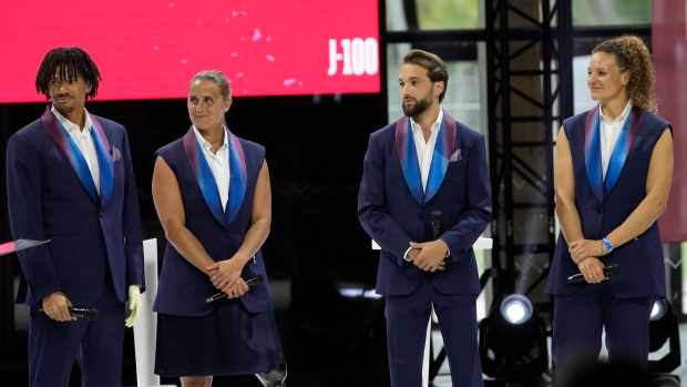 French athletes showcase the Berluti uniforms for the Paris 2024 Olympic Games opening ceremony