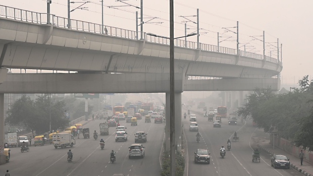 Road transport is estimated to account for as much as 30% of the air pollution that can shroud India’s biggest urban centers. Photographer: Prakash Singh/Bloomberg
