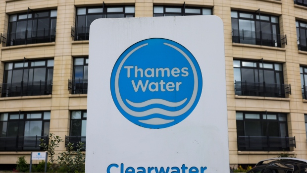 A sign outside the Thames Water headquarters in Reading, UK, on Wednesday, April. 24, 2024. Thames Water needs to spend £19.8 billion ($24.4 billion) through 2030 to fix leaks, boost sewage treatment capacity and make the country’s water network more resilient to the weather extremes caused by global warming, paid for partly through higher bills for consumers. Photographer: Carlos Jasso/Bloomberg