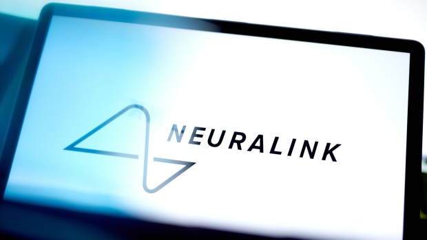 The Neuralink logo on a laptop arranged in New York, US, on Wednesday, Jan. 31, 2024. Elon Musk said that the first human patient has received a brain implant from his startup Neuralink Corp., a significant step forward for the company that aims to one day let humans control computers with their minds. Photographer: Gabby Jones/Bloomberg