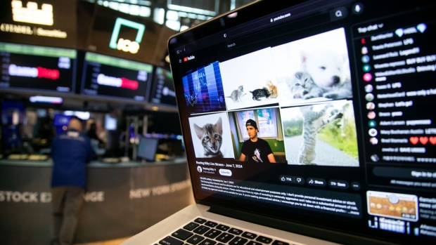 <p>Keith Gill during a YouTube livestream arranged on a laptop at the New York Stock Exchange on June 7.</p>