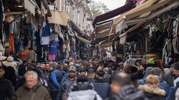 <p>Shoppers at a market street in Istanbul.</p>