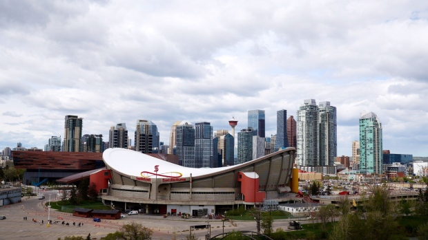 <p>The Scotiabank Saddledome and downtown skyline in Calgary, Alberta, Canada.</p>