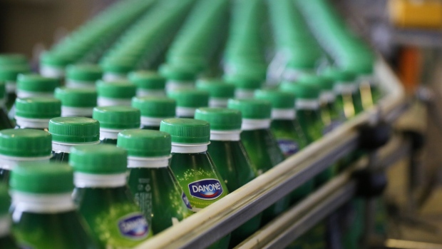 Bottles of Activia yogurt on the production line. Photographer: Andrey Rudakov/Bloomberg