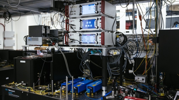 Laser heads and laser controllers at the quantum computing lab inside the University of Chicago’s Eckhardt Research Center.