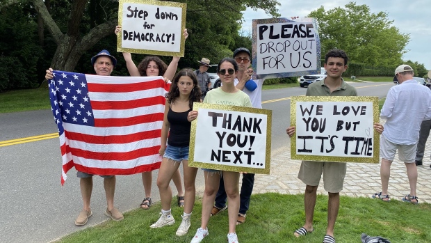 Demonstrators protest outside of a fundraiser for President Joe Biden in the Hamptons on June 29. Photographer: Amanda Gordon/Bloomberg