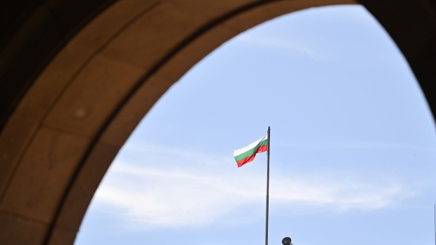 A Bulgarian national flag flies on a government building in Sofia, Bulgaria, on Friday, March 29, 2024. Bulgaria headed toward its sixth general election since 2021 after a last-ditch effort to form a cabinet failed, bringing down a unity government that had aimed to halt political instability. Photographer: Oliver Bunic/Bloomberg